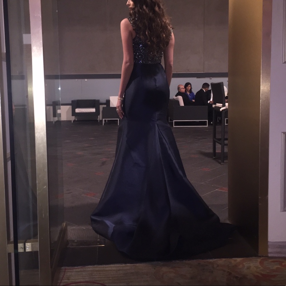 Long navy gown with embellishments and slit